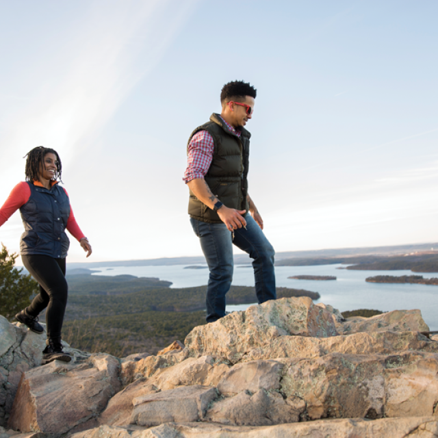 three people hiking at Pinnacle Mountain state park