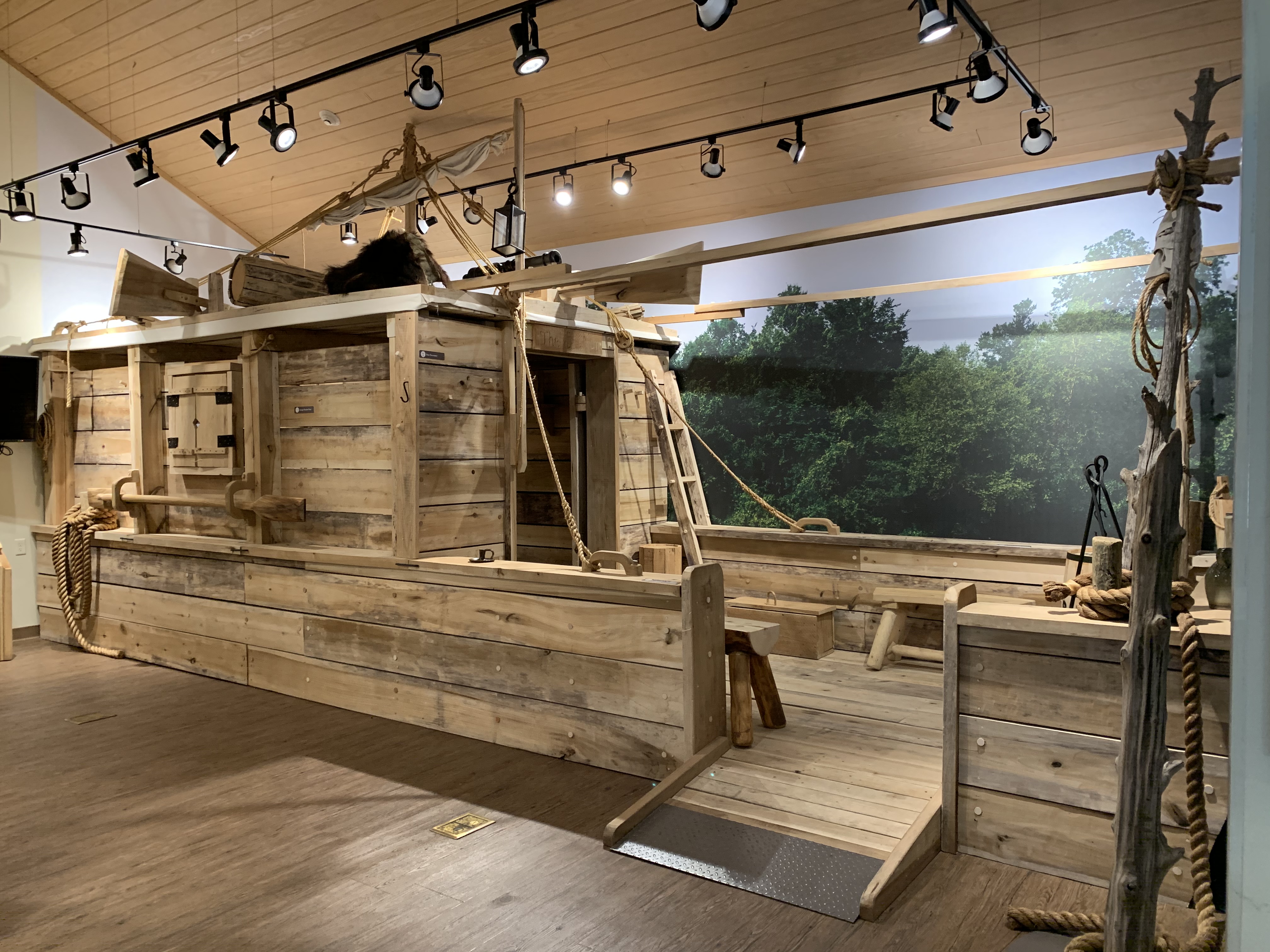 Side view of the life-sized flatboat found in the visitor center at Davidsonville Historic State Park 