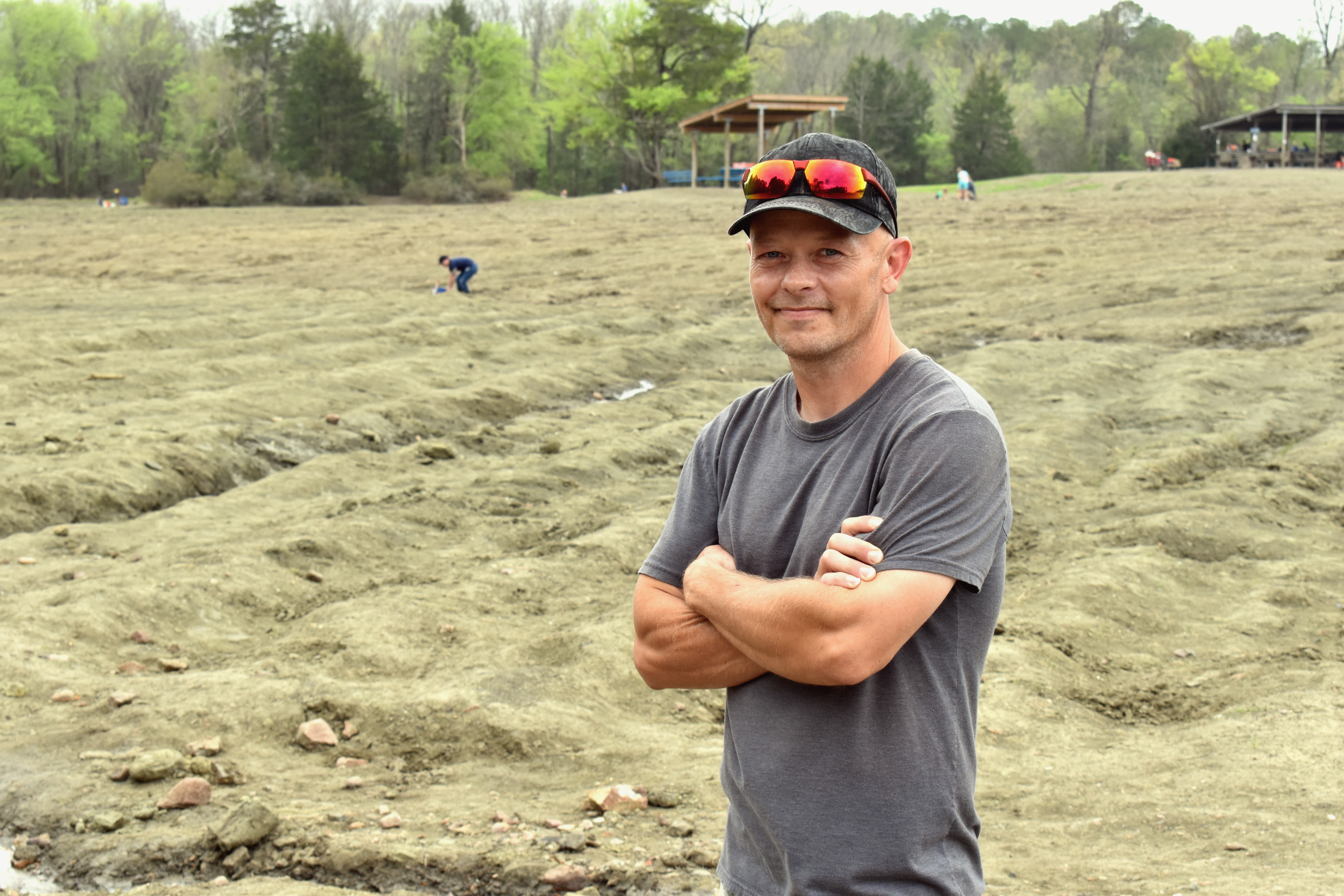 Adam Hardin standing in the search field at Crater of Diamonds State Park
