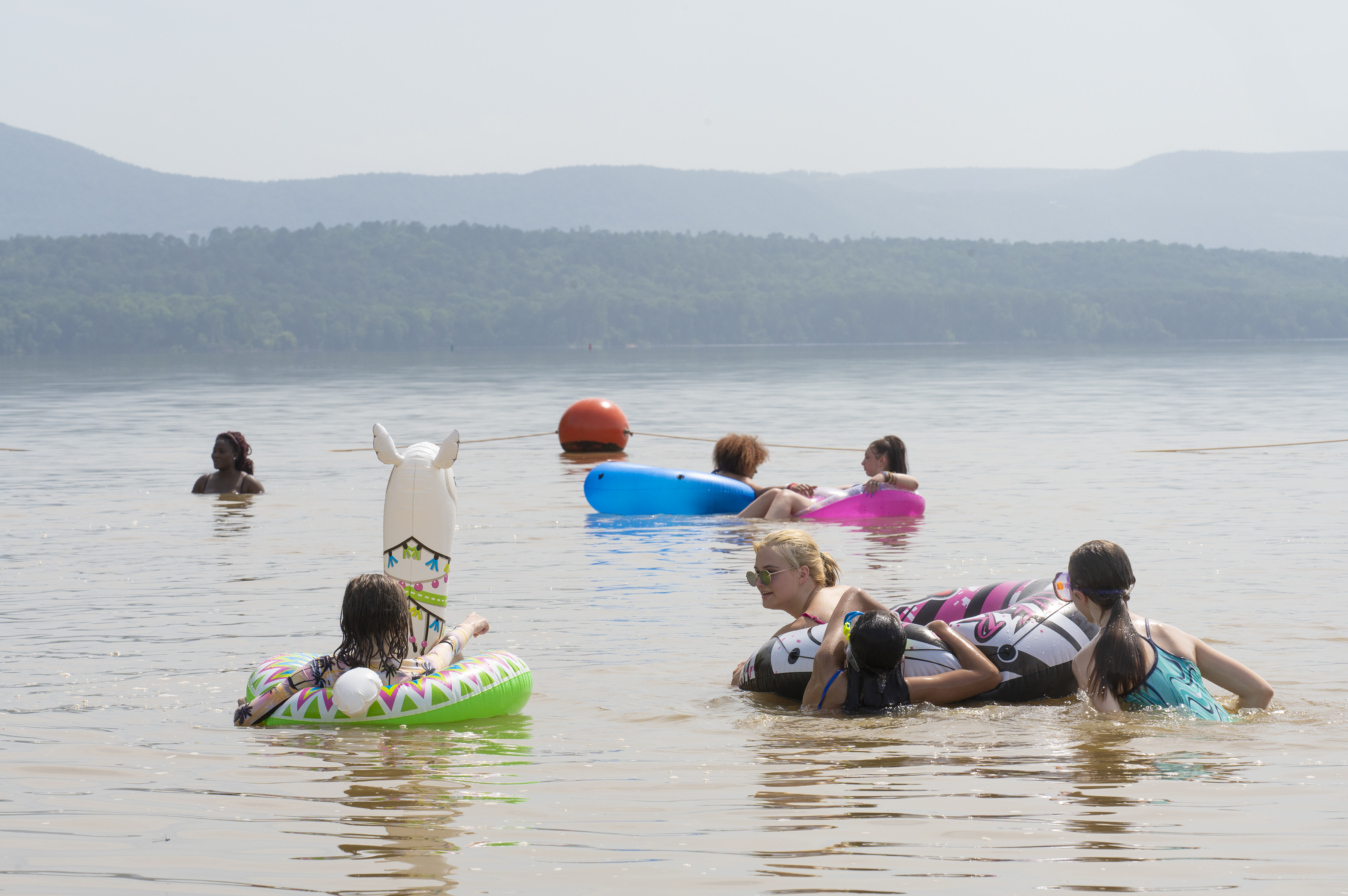 Visitors floating in the lake in floats