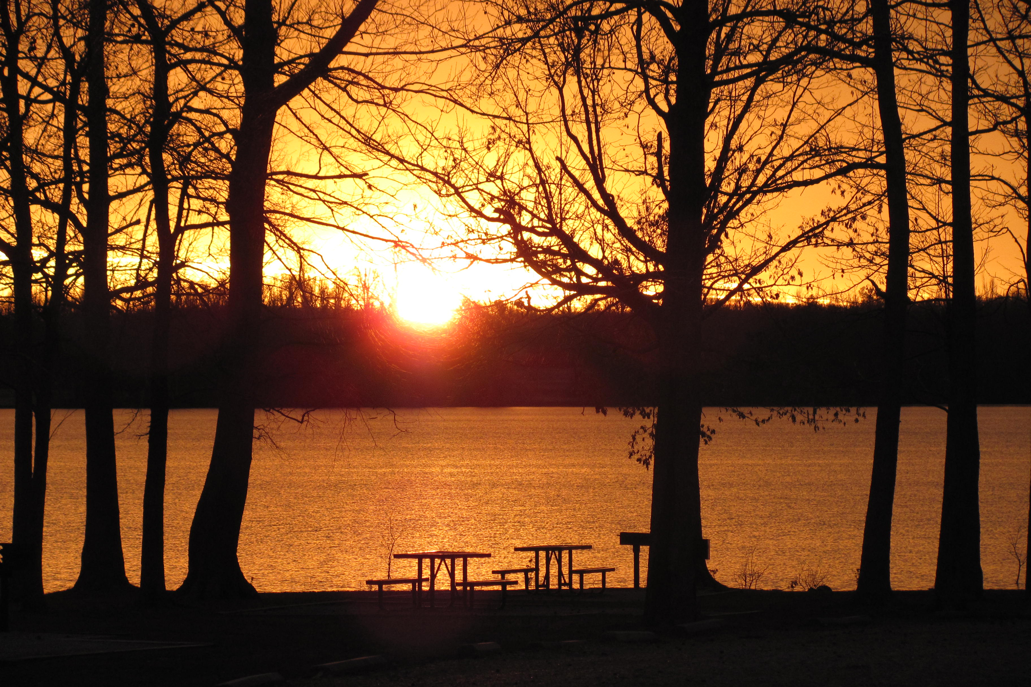 Beautiful orange sunset on lake at Lake Frierson State park