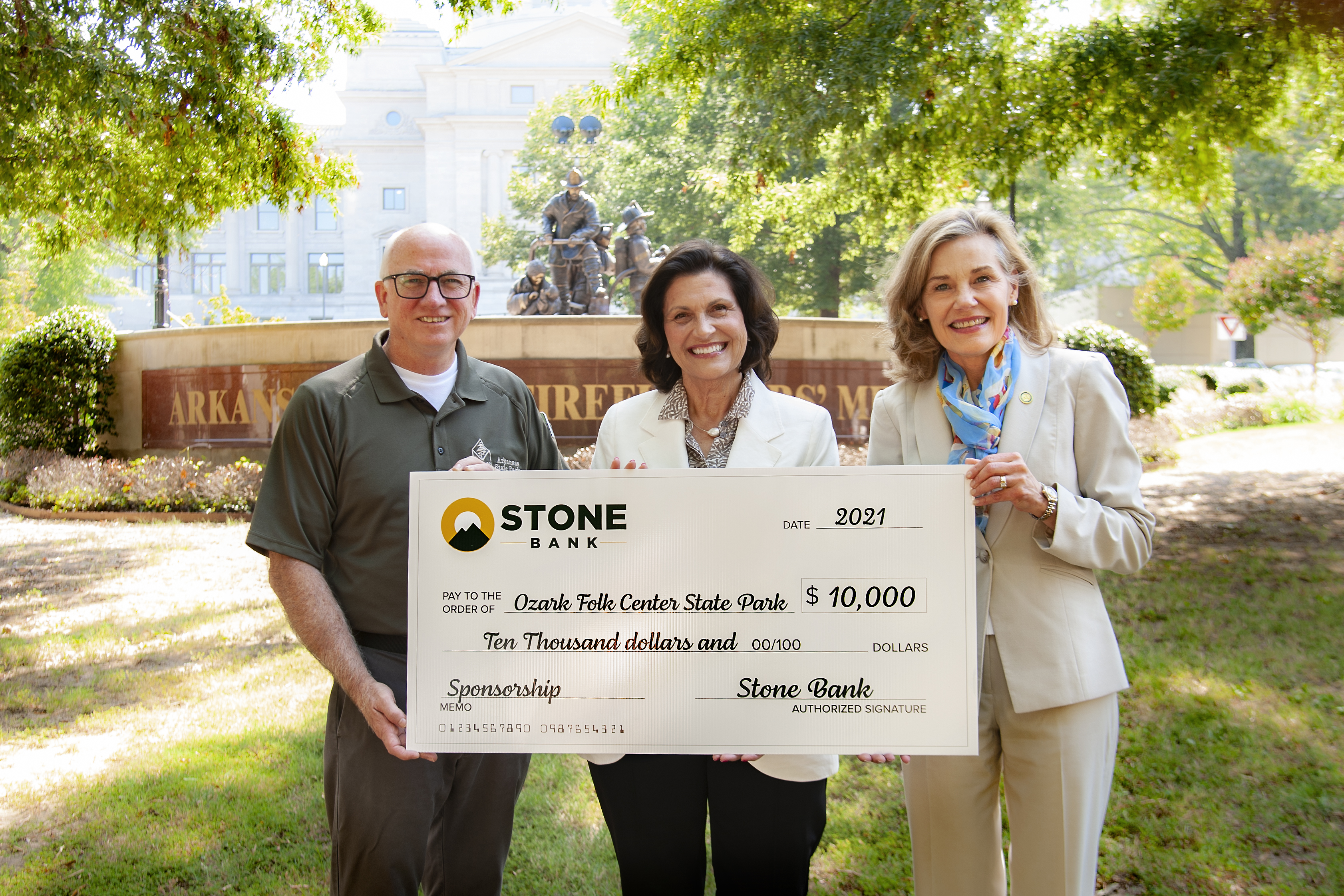 From left to right: Arkansas State Parks Director Grady Spann, Stone Bank Chief Executive Officer Marnie Oldner, Arkansas Department of Parks, Heritage & Tourism Secretary Stacy Hurst 