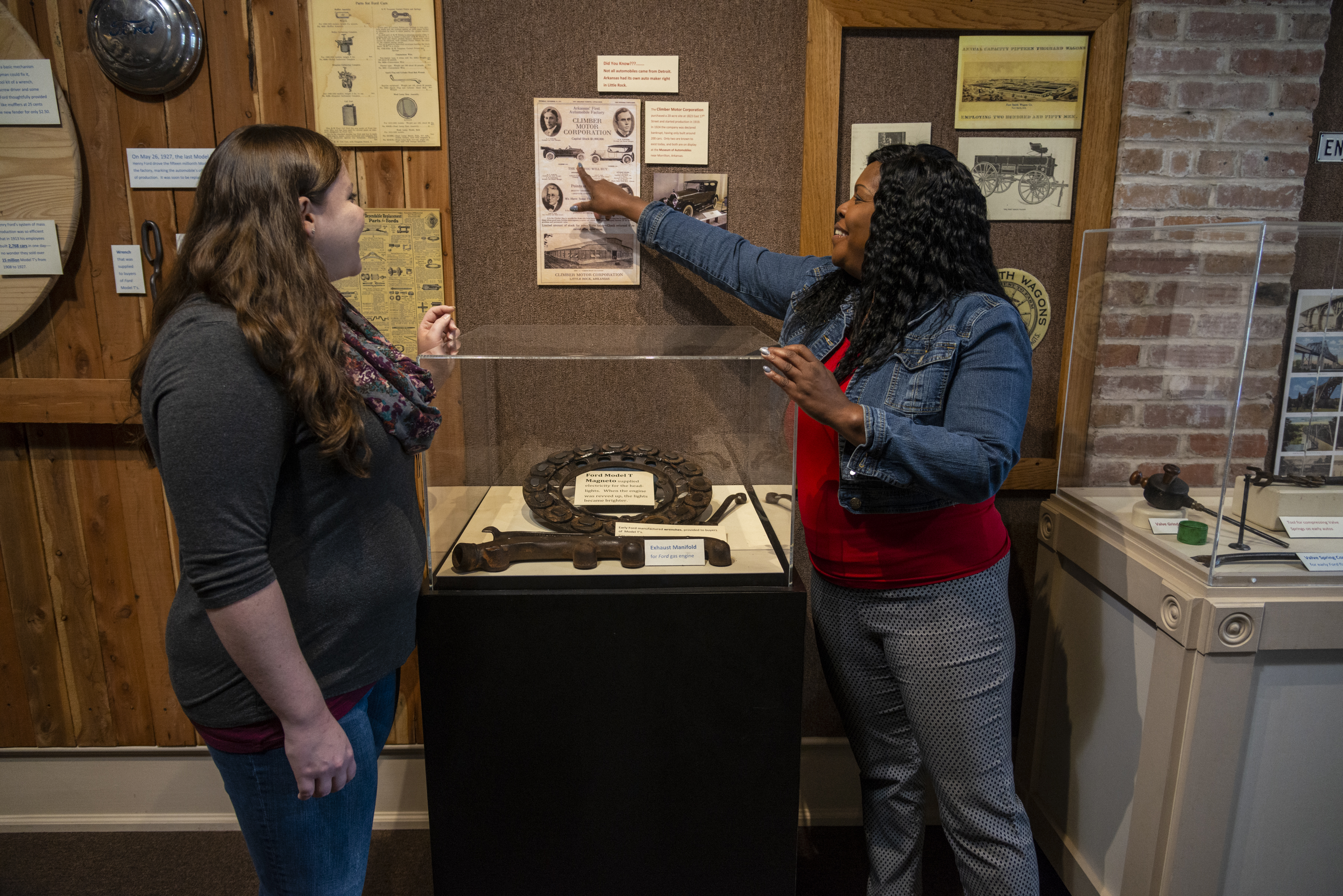 Two women exploring an exhibit at Plantation Agriculture Museum