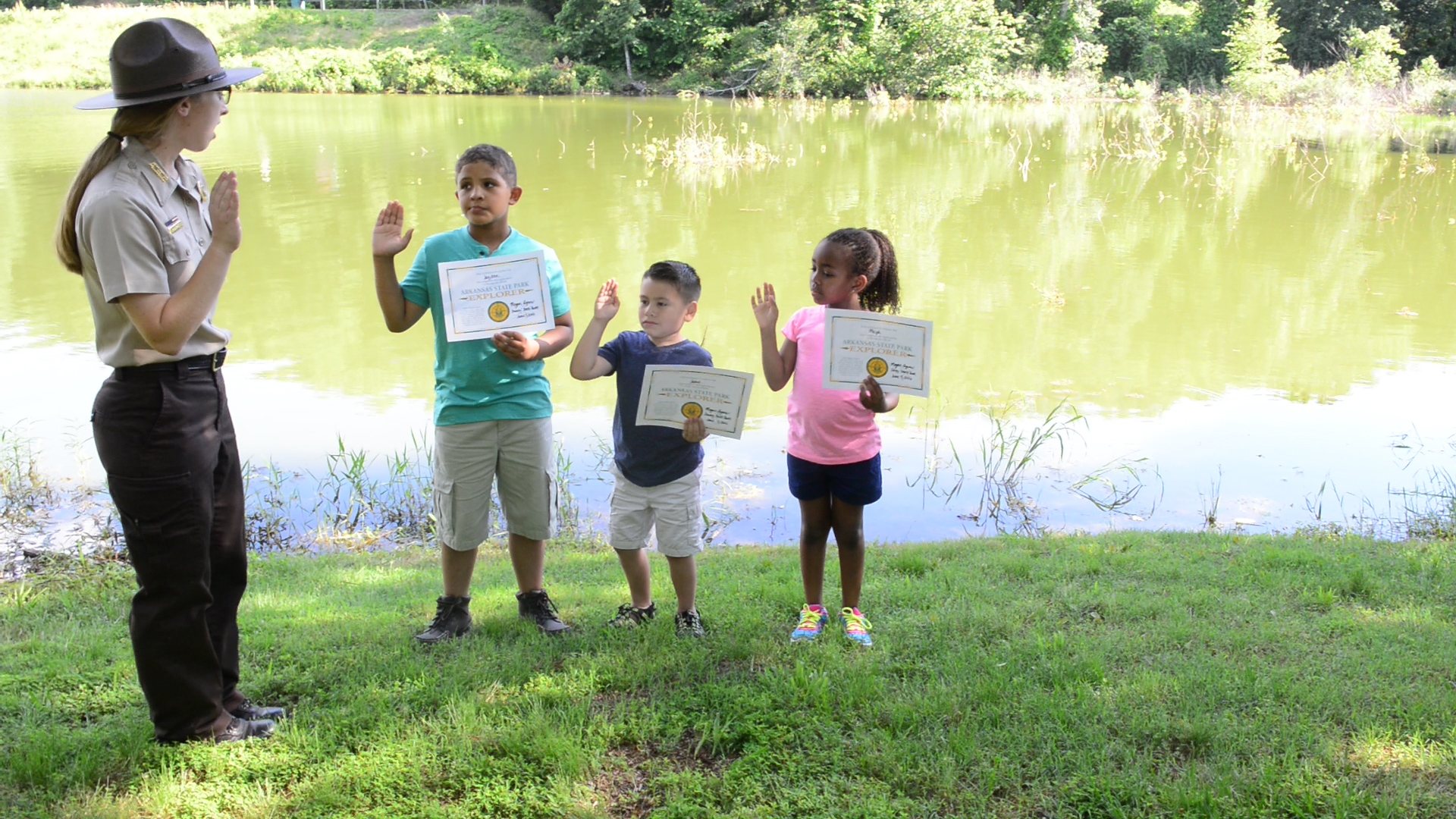 Kids taking State Park Explorer pledge