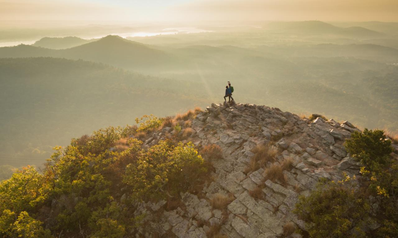 Standing atop Pinnacle Mountain