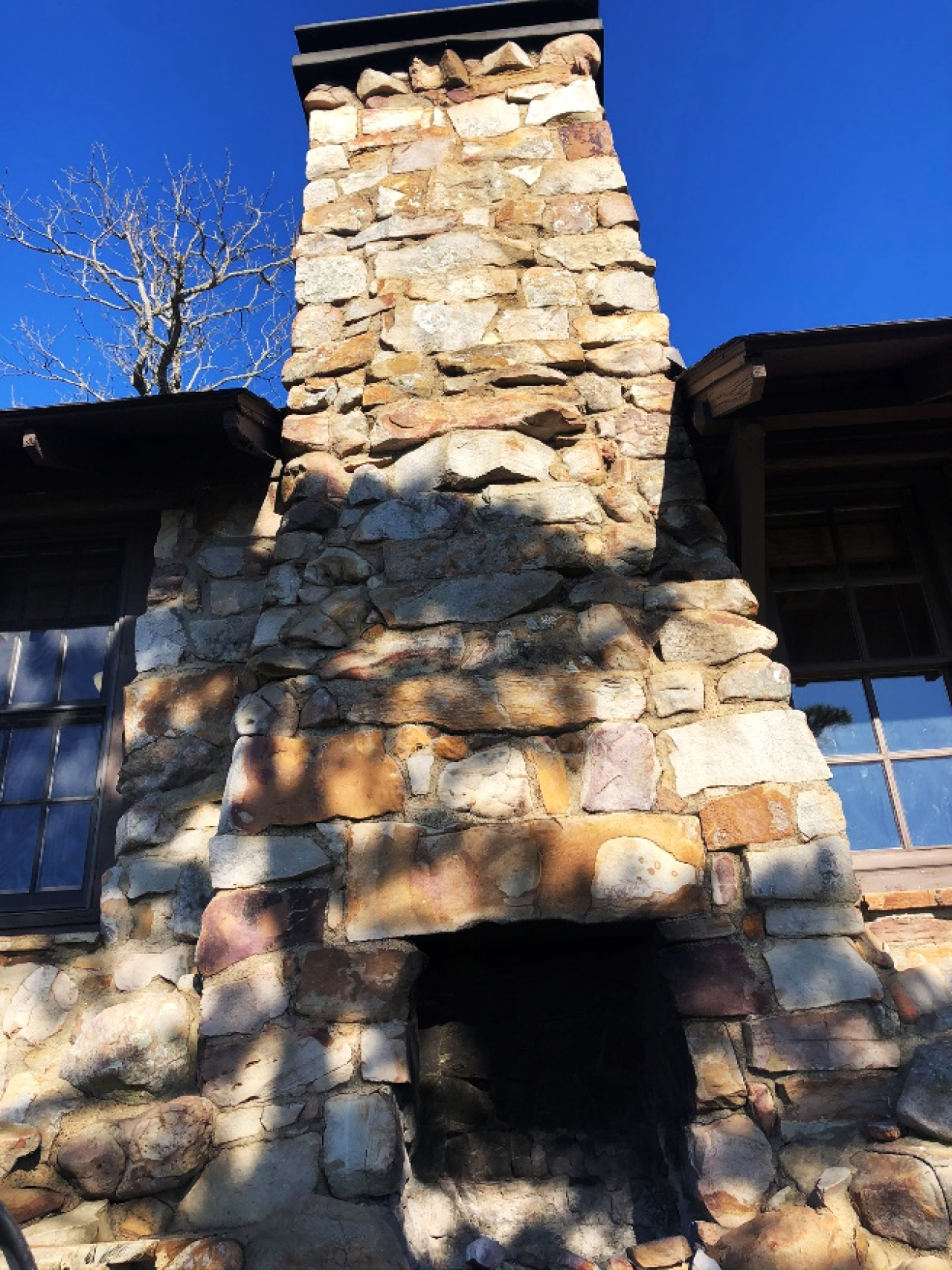 A view of the outdoor fireplace at Cabin 3 at Mount Nebo State Park