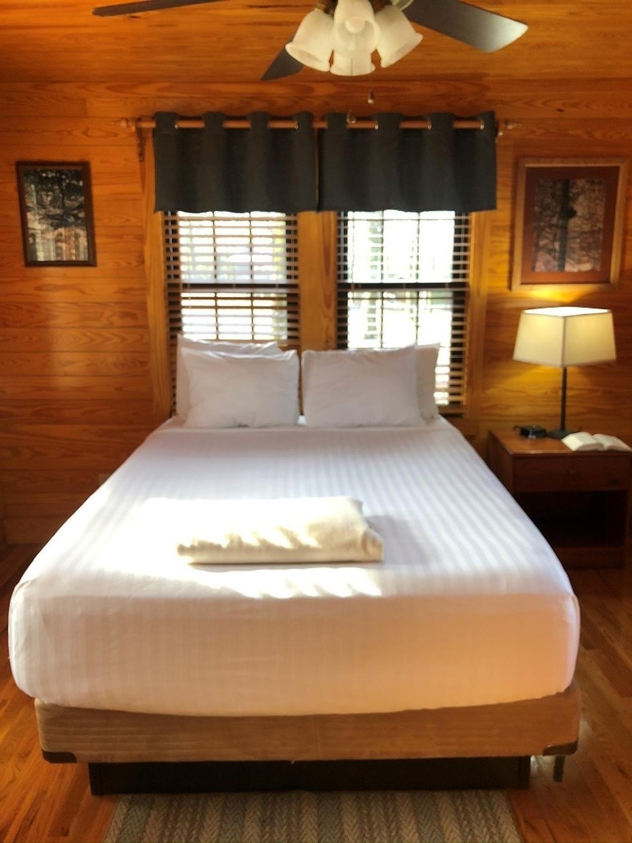 A view of the bedroom at Cabin 9 at Mount Nebo State Park