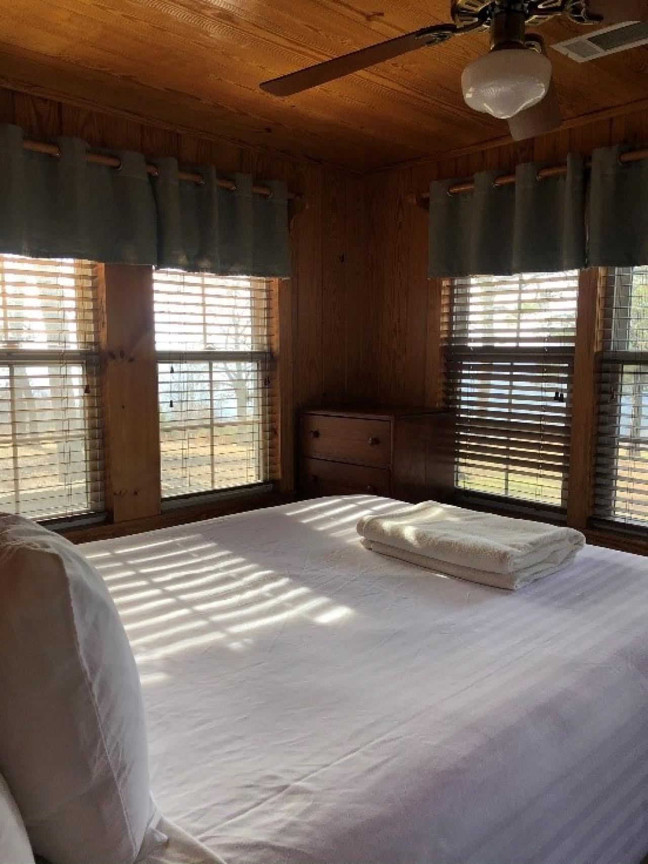 A view of the bedroom at Cabin 13 at Mount Nebo State Park