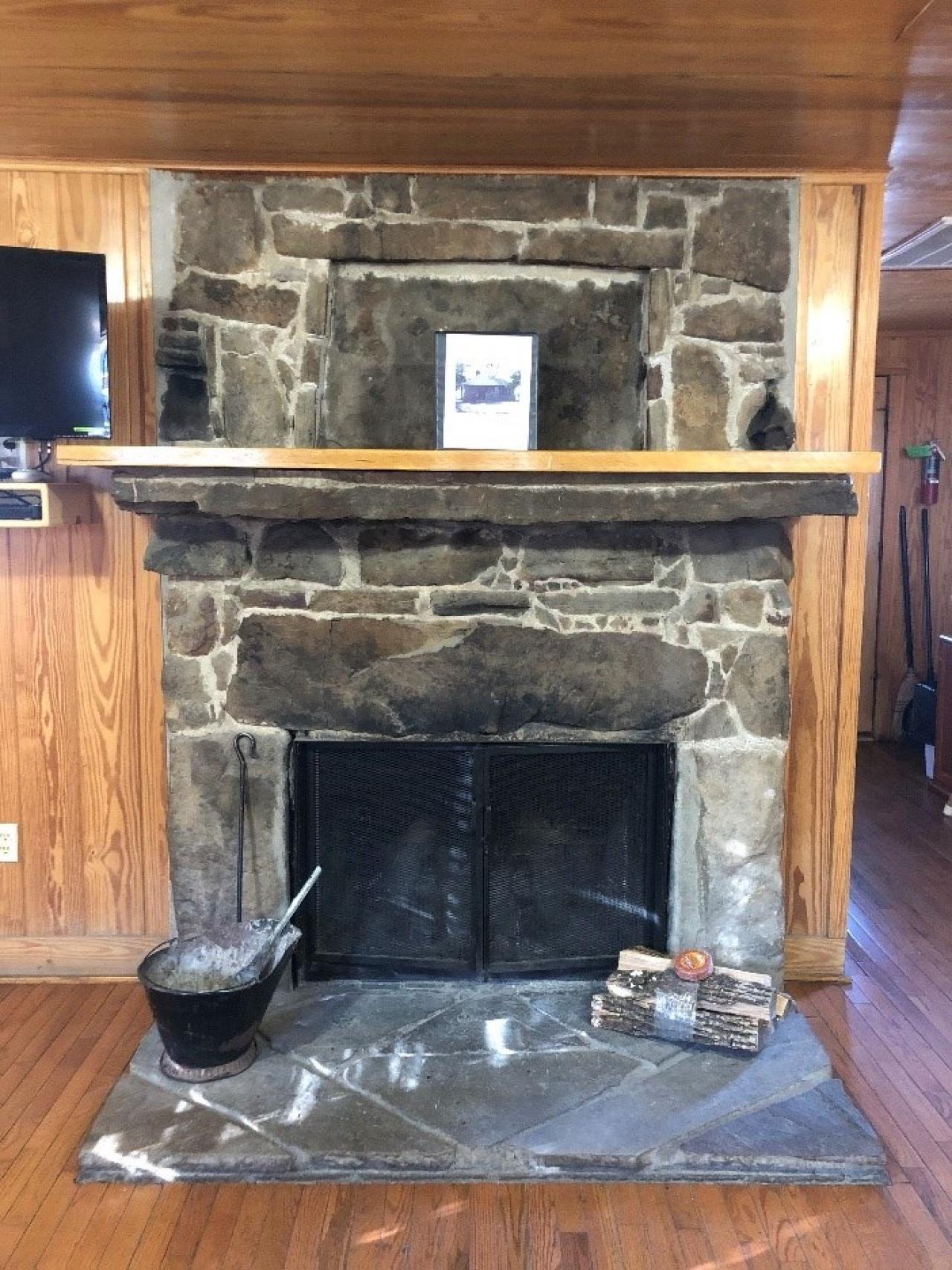 The stone fireplace at Cabin 15 at Mount Nebo State Park