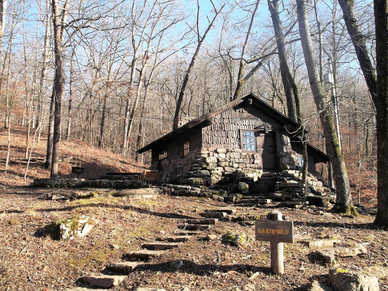 An exterior view of cabin 17 including the stone staircase that leads to the front entryway
