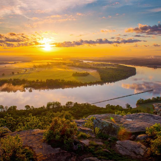 A sunset view overlooking Stouts Point at Petit Jean State Park