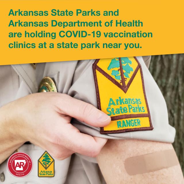 Arkansas State Parks and Arkansas Dept. of Health offer free public COVID-19 vaccine clinics. Pictured, state park ranger patch on shirt with sleeve rolled up showing band-aid.