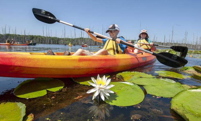 Paddling in the lilly pads at Cane Creek State Park