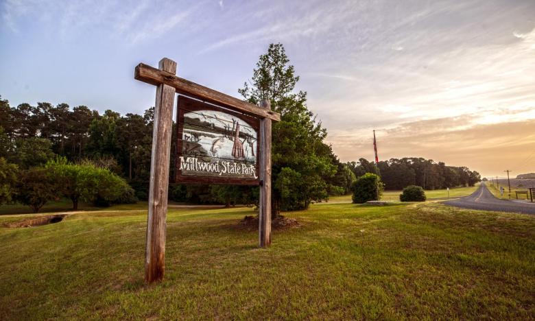 Millwood State Park sign at sunset