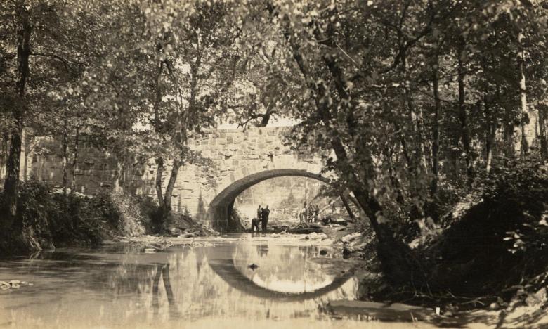 Historic photos of the Davies Bridge care of Petit Jean State Park.