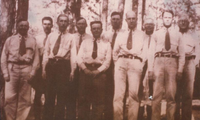 Historic photo of CCC foremen at Petit Jean State Park.