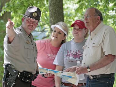 Arkansas State Park Interpreter Helping Visitors