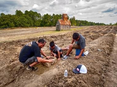 Family searching for diamonds at Crater of Diamonds State Park