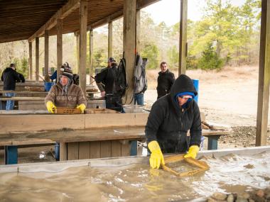 Visitors sift for diamonds at Crater of Diamonds State Park.