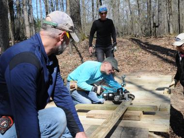 A Year to Volunteer working at Cane Creek State Park. 