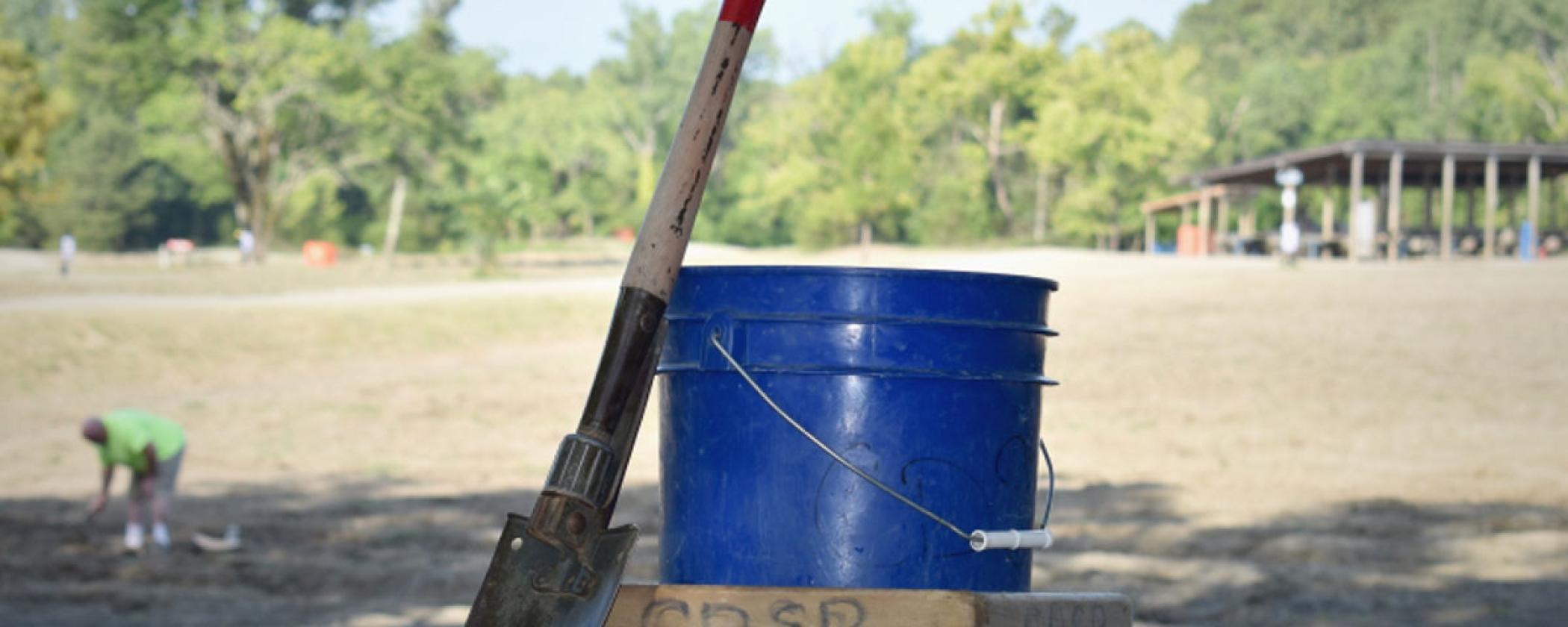 shovel, blue bucket and screen for searching for diamonds at Crater of Diamonds State Park