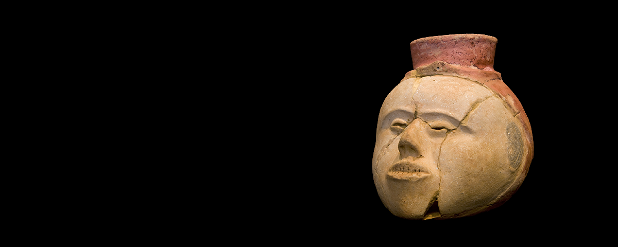 Clay face pot at Parkin Archeological State Park exhibit