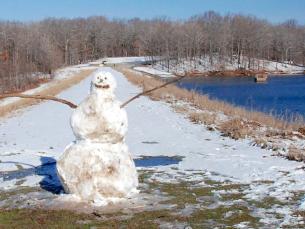 Snowman on the Lake Dunn Dam