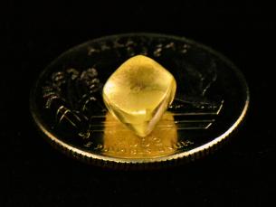 2021 largest diamond found at Crater of Diamonds State Park. It's a 4.38 carat yellow diamond sitting on top of a quarter for scale