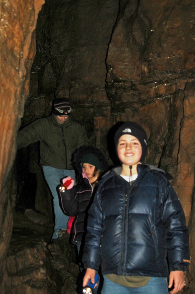 DSC_0802A Spencer Foster, Laurel Chafin, and Jay Chafin delight in finding tri-colored bats (Perimyotis subflavus) hibernating in Devil’s Den Cave