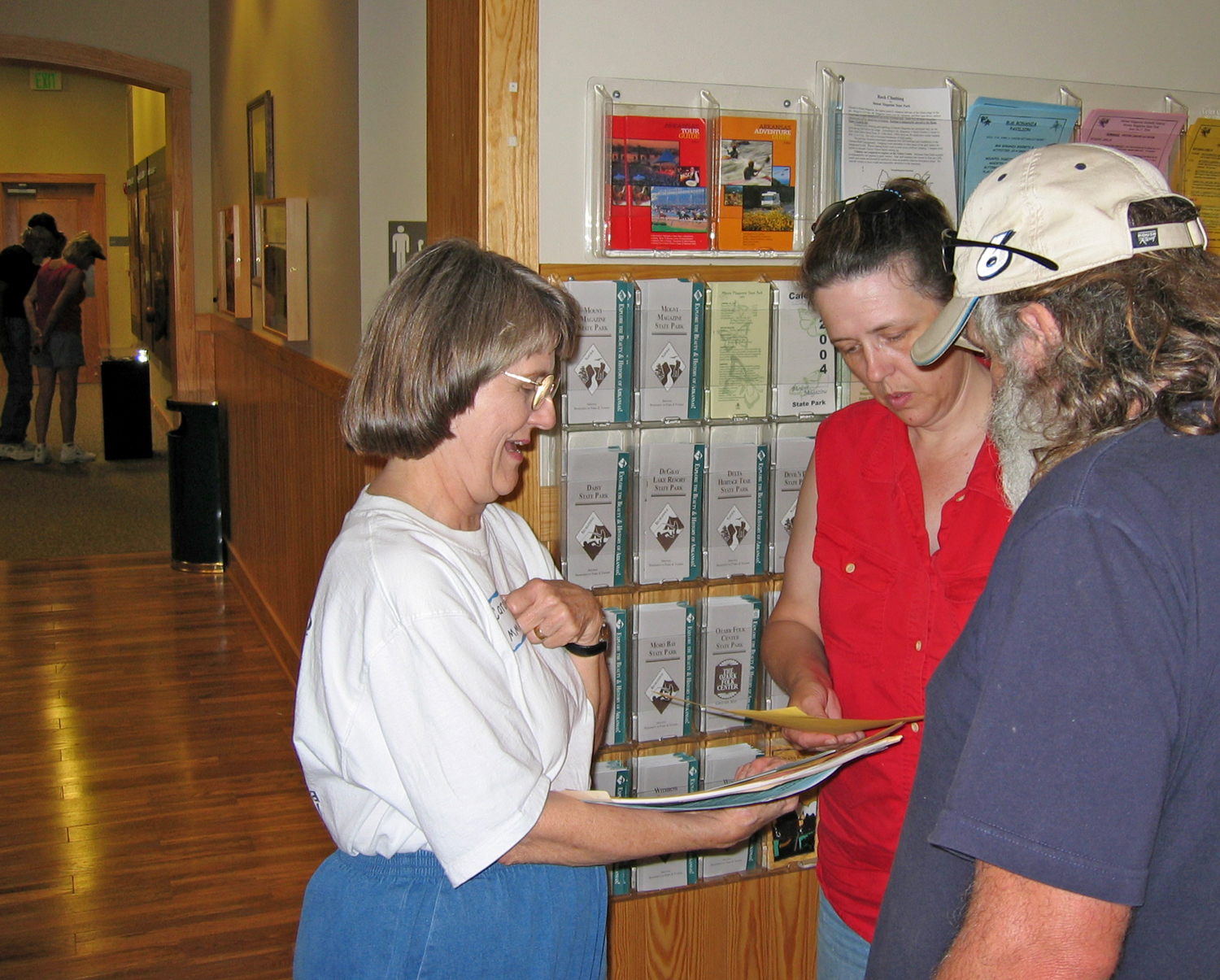 Volunteer Carolyn Allen greets and orients visitors.